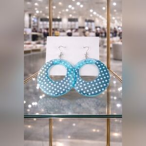 Blue Circle dangly earring with white polka-dots.